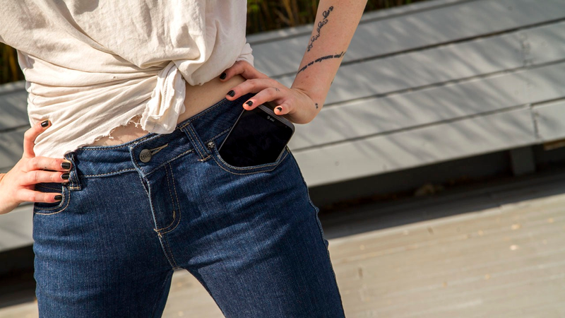 Illustration for article titled Giant Smartphones in Skinny Jeans: A Photoshoot
